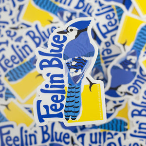 blue jay bird sticker that says feelin blue with a blue jay illustration