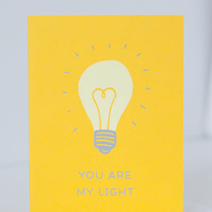 valentine's themed greeting card with a lightbulb that says "you are my light"