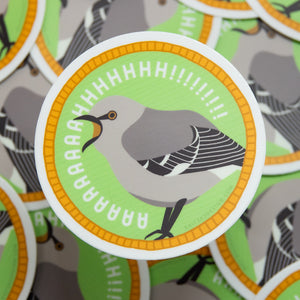 Sticker with a bird illustration and text on a green background