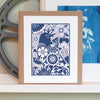 american robin in a garden art print in blue ink