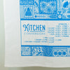 Kitchen conversion chart on a white towel with blue text and patterns