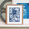 cat in the garden art print in blue ink