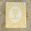 Greeting card with 'Forever Starts Today Congrats!' text on a yellow and white patterned background.