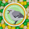 Sticker of a mockingbird with sound effects on a bed of colorful jelly beans