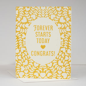 Greeting card with yellow and white heart pattern and text 'Forever Starts Today Congrats!' on a white background