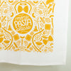 White towel with yellow pasta-themed design and 'more pasta please' text.