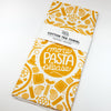 Cotton tea towel with pasta pattern and 'more pasta please' text on a white background
