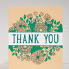 Card with floral design and 'Thank You' text on a beige background