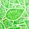 leaf me alone punny sticker in bright green leaf shape