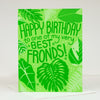 Green birthday card with leaf patterns and text on a white background