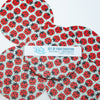 Set of four ladybug pattern coasters with a visible brand label.