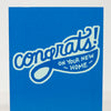 Blue card with white text 'Congrats on your new home' on a white background