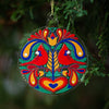 Cardinal bird Christmas tree ornament in a folk art style