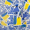 blue jay bird sticker that says feelin blue with a blue jay illustration