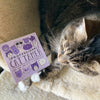 cat tamer sticker in purple