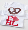 two examples of Philadelphia themed baby gifts
