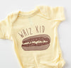 whiz kid baby onesie with philly cheesesteak in brown ink on a yellow onesie